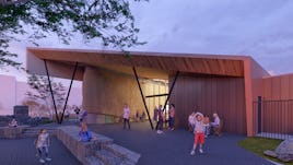 Amazeum entrance at dusk