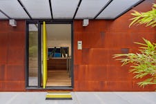 Builtform construction 441tamresidence detail open front door modern steel smaller